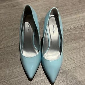 $12 heels never worn. Light blue